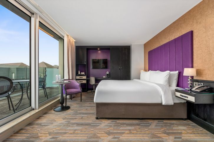 Rooms & Suites at The Trinity City Hotel